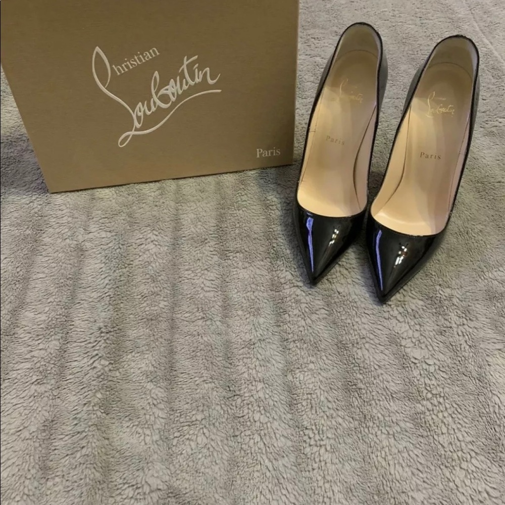 Christian Louboutin patent leather pumps black.